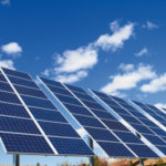 solar panels over blue sky